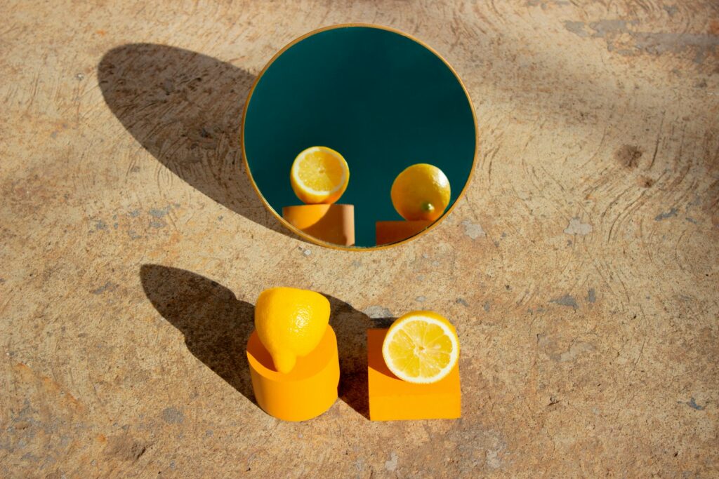 lemondsd in a bucket on a beach